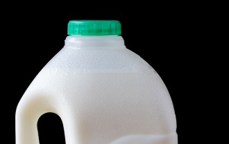 Top of full plastic milk bottle