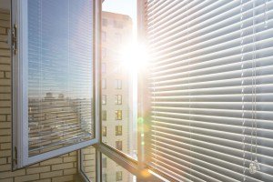 Horizontal plastic jalousie under sun rays